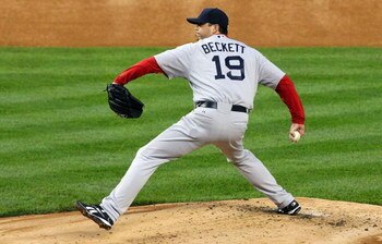 NEW YORK - MAY 05:  Josh Beckett #19 of the Boston Red Sox delivers a pitch against the New York Yankees on May 5, 2009 at Yankee Stadium in the Bronx borough of New York City. The Red Sox defeated the Yankees 7-3.  (Photo by Jim McIsaac/Getty Images)