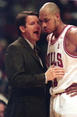 22 Feb 2001:  Head Coach Tim Floyd of the Chicago Bulls talks to Marcus Fizer #21 during the game against the Los Angeles Clippers at the United Center in Chicago, Illinois.  The Clippers defeated the Bulls 93-80.NOTE TO USER: It is expressly understood t