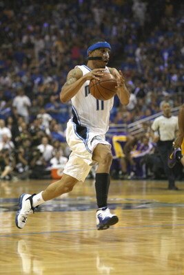 ORLANDO, FL - JUNE 14:  Courtney Lee #11 of the Orlando Magic moves the ball against the Los Angeles Lakers in Game Five of the 2009 NBA Finals on June 14, 2009 at Amway Arena in Orlando, Florida. The Lakers won 99-86. NOTE TO USER:  User expressly acknow