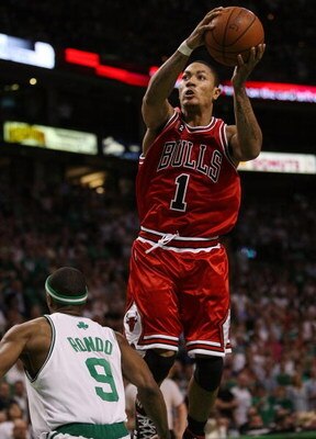 BOSTON - APRIL 28:  Derrick Rose #1 of the Chicago Bulls nabs the rebound as Rajon Rondo #9 of the Boston Celtics defends in Game Five of the Eastern Conference Quarterfinals during the 2009 NBA Playoffs at TD Banknorth Garden on April 28, 2009 in Boston,