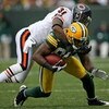 GREEN BAY, WI - NOVEMBER 16:  Wide receiver Greg Jennings #85 of the Green Bay Packers makes a reception for nine yards and is tackled by Nathan Vasher #31 of the Chicago Bears during NFL action at Lambeau Field on November 16, 2008 in Green Bay, Wisconsi