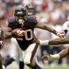 HOUSTON - DECEMBER 14: Running back Steve Slaton #20 of the Houston Texans carries the ball against the Tennessee Titans on December 14, 2008 at Reliant Stadium in Houston, Texas.  The Texans won 13-12.  (Photo by Stephen Dunn/Getty Images)