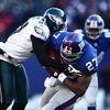 EAST RUTHERFORD, NJ -  JANUARY 11:  Brandon Jacobs #27 of the New York Giants runs the ball against the Philadelphia Eagles during the NFC Divisional Playoff Game on January 11, 2009 at Giants Stadium in East Rutherford, New Jersey.  The Eagles defeated t