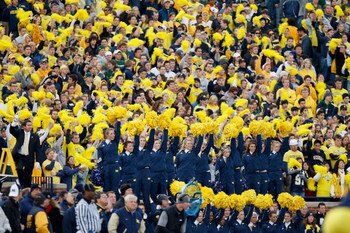 ANN ARBOR, MI - OCTOBER 25:  Fans of the Michigan Wolverines cheer from the stands during the game against the Michigan State Spartans on October 25, 2008 at Michigan Stadium in Ann Arbor, Michigan. Michigan State won the game 35-21. (Photo by Gregory Sha