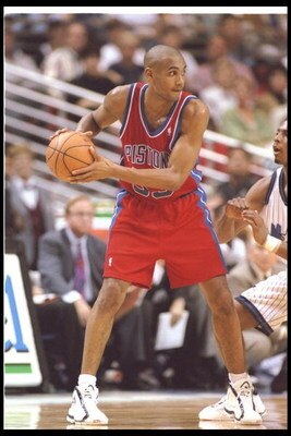 27 Nov 1995:  Forward Grant Hill of the Detroit Pistons moves the ball during a game against the Orlando Magic at the Orlando Arena in Orlando, Florida.  The Magic won the game, 96-95. Mandatory Credit: ALLSPORT USA  /Allsport Mandatory Credit: ALLSPORT U