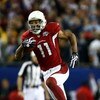 TAMPA, FL - FEBRUARY 01:  Wide receiver Larry Fitzgerald #11 of the Arizona Cardinals scores a 64-yard touchdown reception in the fourth quarter against the Pittsburgh Steelers during Super Bowl XLIII on February 1, 2009 at Raymond James Stadium in Tampa,