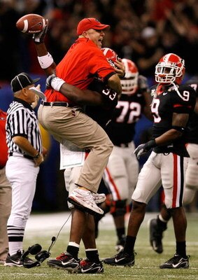 NEW ORLEANS - JANUARY 01:  Defensive coordinator Willie Martinez and Dannell Ellerbe #33 of the Georgia Bulldogs celebrate after Ellerbe intercepted the ball against the Hawai'i Warriors during the Allstate Sugar Bowl at the Louisiana Superdome on January