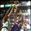12 Apr 1996:  Center Acie Earl of the Toronto Raptors and Pervis Ellison of the Boston Celtics fight for the ball during a game played at the Fleet Center in Boston, Massachusetts.  The Celtics won the game, 136-108. Mandatory Credit: ALLSPORT USA  /Allsp