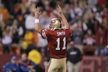 SAN FRANCISC0 - AUGUST 16: Quarterback Alex Smith #11 of the San Francisco 49ers signals touchdown against the Green Bay Packers during a preseason game on August 16, 2008 at Candlestick Park in San Francisco, California.  (Photo by Greg Trott/Getty Image