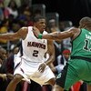 ATLANTA - APRIL 26: Guard Joe Johnson #2 of the Atlanta Hawks dribbles around forward Glen Davis #11 of the Boston Celtics during Game Three of the Eastern Conference Quarterfinals against the Atlanta Hawks during the 2008 NBA Playoffs at the Philips Aren