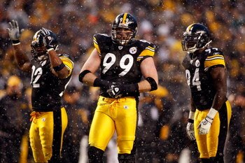 PITTSBURGH - JANUARY 11:  (L-R) James Harrison #92, Brett Keisel #99 and Lawrence Timmons #94 of the Pittsburgh Steelers look on against the San Diego Chargers during their AFC Divisional Playoff Game on January 11, 2009 at Heinz Field in Pittsburgh, Penn