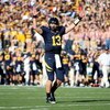 BERKELEY, CA - NOVEMBER 22:  Kevin Riley #13 of the California Golden Bears signals for a touchdown against the Stanford Cardinal during an NCAA football game on November 22, 2008 at Memorial Stadium in Berkeley, California.  (Photo by Jed Jacobsohn/Getty
