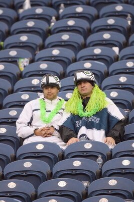 SEATTLE - NOVEMBER 02:  Lonely fans of the Seattle Seahawks sit in the seats after the game against the Philadelphia Eagles at Qwest Field on November 2, 2008 in Seattle, Washington. (Photo by Otto Greule Jr/Getty Images)