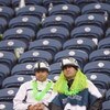 SEATTLE - NOVEMBER 02:  Lonely fans of the Seattle Seahawks sit in the seats after the game against the Philadelphia Eagles at Qwest Field on November 2, 2008 in Seattle, Washington. (Photo by Otto Greule Jr/Getty Images)