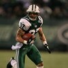EAST RUTHERFORD, NJ - DECEMBER 10:  Laveranues Coles #87 of the New York Jets runs the ball against the Buffalo Bills on December 10, 2006 at Giants Stadium in East Rutherford, New Jersey.  (Photo by Travis Lindquist/Getty Images)