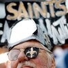 NEW ORLEANS - SEPTEMBER 24:  A Saints fan poses for a photo outside the Superdome before the Tennessee Titans play the New Orleans Saints on September 24, 2007 at the Louisiana Superdome in New Orleans, Louisiana.  (Photo by Chris Graythen/Getty Images)
