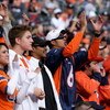 DENVER - NOVEMBER 23:  Fans of the Denver Broncos support their team against the Oakland Raiders during week 12 NFL action at Invesco Field at Mile High on November 23, 2008 in Denver, Colorado. The Raiders defeated the Broncos 31-10.  (Photo by Doug Pens