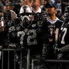 SAN DIEGO - DECEMBER 04:  Oakland Raiders fans look on during the NFL Game against the San Diego Chargers on December 4, 2008 at Qualcomm Stadium in San Diego, California.  (Photo by Harry How/Getty Images)