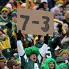GREEN BAY, WI - NOVEMBER 16:  A fan in a Brett Favre #4 New York Jets jersey displays the record of the Jets while spectating as the Chicago Bears face the Green Bay Packers during NFL action at Lambeau Field on November 16, 2008 in Green Bay, Wisconsin. 