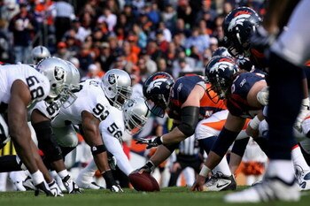 DENVER - NOVEMBER 23:  The Denver Broncos offense lines up on the line of scrimmage against the Oakland Raiders defense during week 12 NFL action at Invesco Field at Mile High on November 23, 2008 in Denver, Colorado. The Raiders defeated the Broncos 31-1