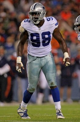 DENVER - AUGUST 16:  Linebacker Greg Ellis #98 of the Dallas Cowboys prepares for action against the Denver Broncos during preseason NFL action at Invesco Field at Mile High on August 16, 2008 in Denver, Colorado. The Broncos defeated the Cowboys 23-13.  