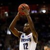 KANSAS CITY, MO - MARCH 21:  Tyreke Evans #12 of the Memphis Tigers looks to make a pass play during their second round game against the Maryland Terrapins in the NCAA Division I Men's Basketball Tournament at the Sprint Center on March 21, 2009 in Kansas