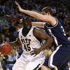 BOSTON - MARCH 26:  DeJuan Blair #45 of the Pittsburgh Panthers tries to drive past Kenny Frease #32 of the Xavier Musketeers during the NCAA Men's Basketball Tournament East Regionals at TD Banknorth Garden on March 26, 2009 in Boston, Massachusetts.  (P