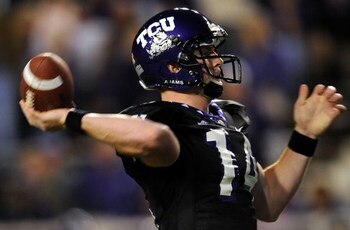 FORT WORTH, TX - OCTOBER 16:  Quarterback Andy Dalton #14 of the TCU Horned Frogs drops back to pass against the BYU Cougars in the first quarter at Amon G. Carter Stadium on October 16, 2008 in Fort Worth, Texas.  (Photo by Ronald Martinez/Getty Images)