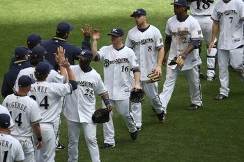 MILWAUKEE - MAY 14: Mike Cameron #25, Chris Duffy #16, Ryan Braun #6 and Rickie Weeks #23 of the Milwaukee Brewers celebrate a win over the Florida Marlins with teammates on May 14, 2009 at Miller Park in Milwaukee, Wisconsin. The Brewers defeated the Mar