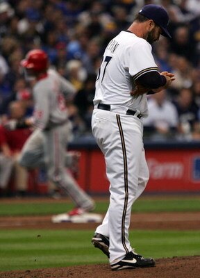 MILWAUKEE - OCTOBER 05:  Jeff Suppan #37 of the Milwaukee Brewers walks back to the mound after surrendering a home run to Jayson Werth #28 of the Philadelphia Phillies in game four of the NLDS during the 2008 MLB playoffs at Miller Park on October 5, 200