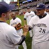 MILWAUKEE - SEPTEMBER 28:  Prince Fielder #28 of the Milwaukee Brewers congratulates teammate Ryan Braun #8 as they celebrate clinching the National League Wild Card after the game against the Chicago Cubs at Miller Park on September 28, 2008 in Milwaukee