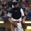 MILWAUKEE - MAY 10: Jason Kendall #18 of the Milwaukee Brewers reacts after making an error in the 3rd inning against the Chicago Cubs on May 10, 2009 at Miller Park in Milwaukee, Wisconsin. The Cubs defeated the Brewers 4-2. (Photo by Jonathan Daniel/Get