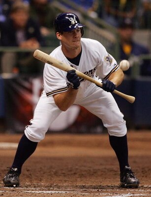 MILWAUKEE - OCTOBER 04: Dave Bush #31 of the Milwaukee Brewers bunts against the Philadelphia Phillies in Game three of the NLDS during the 2008 MLB playoffs at Miller Park on October 4, 2008 in Milwaukee, Wisconsin. (Photo by Jim McIsaac/Getty Images) 