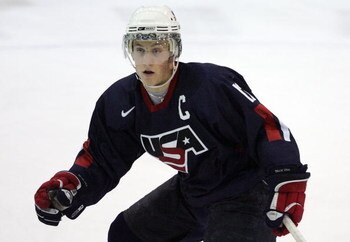 LAKE PLACID, NY - AUGUST 09: Jordan Schroeder #12 of Team USA skates against Team Sweden at the USA Hockey National Junior Evaluation Camp on August 9, 2008 at the Olympic Center in Lake Placid, New York.  (Photo by Bruce Bennett/Getty Images)
