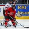 LONDON,ON - JANUARY 3:  Andrew Agozzino #15 of Team Ontario stands in front of Carter Ashton #9 of Team West in a game on January 3, 2008 at the John Labatt Centre in London, Ontario. Team Ontario defeated Team West 4-3 to earn a spot in the gold medal ga