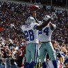 IRVING, TX - OCTOBER 05:  Running back Felix Jones #28 of the Dallas Cowboys celebrates a touchdown with Marion Barber #24 against the Cincinnati Bengals at Texas Stadium on October 5, 2008 in Irving, Texas.  (Photo by Ronald Martinez/Getty Images)