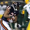 CHICAGO - DECEMBER 22: Matt Forte #22 of the Chicago Bears runs against the Green Bay Packers on December 22, 2008 at Soldier Field in Chicago, Illinois. The Bears defeated the Packers 20-17 in overtime. (Photo by Jonathan Daniel/Getty Images)