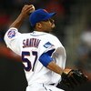 NEW YORK - MAY 11:  Johan Santana #57 of the New York Mets pitches against the Atlanta Braves on May 11, 2009 at Citi Field in the Flushing neighborhood of the Queens borough of New York City.  (Photo by Jim McIsaac/Getty Images)