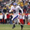 KANSAS CITY, MO - NOVEMBER 29:  Quarterback Todd Reesing #5 of the Kansas Jayhawks runs the ball during the game against the Missouri Tigers on November 29, 2008 at Arrowhead Stadium in Kansas City, Missouri. (Photo by Jamie Squire/Getty Images)