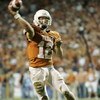 AUSTIN, TX - NOVEMBER 27:  Quarterback Colt McCoy #12 of the Texas Longhorns throws a touchdown to teammate wide receiver Quan Cosby #6 against the Texas A&M Aggies in the final minute of the second quarter at Darrell K Royal-Texas Memorial Stadium Novemb