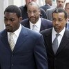RICHMOND, VA - AUGUST 27:  Atlanta Falcons quarterback Michael Vick (R) arrives at federal court with attorney Billy Martin (R) August 27, 2007 in Richmond, Viriginia. Vick pleaded guilty to a federal dogfighting charge.  (Photo by Steve Helber-Pool/Getty