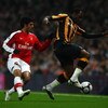 LONDON - MARCH 17:  Carlos Vela of Arsenal challenges Kamil Zayatte of Hull City during the the FA Cup Sponsored by E.on sixth round match between Arsenal and Hull City at Emirates Stadium on March 17, 2009 in London, England.  (Photo by Ryan Pierse/Getty