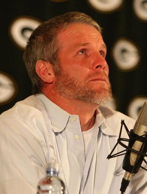 GREEN BAY, WI - MARCH 06: Quarterback Brett Favre of the Green Bay Packers tries to control his emotions at his retirement press conference on March 6, 2008 at Lambeau Field in Green Bay, Wisconsin. (Photo by Jonathan Daniel/Getty Images)