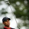 FARMINGDALE, NY - JUNE 21:  Tiger Woods watches his tee shot on the 11th hole during the continuation of the third round of the 109th U.S. Open on the Black Course at Bethpage State Park on June 21, 2009 in Farmingdale, New York.  (Photo by Andrew Redingt
