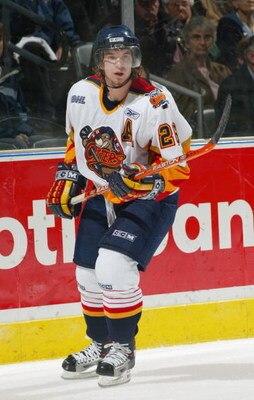 LONDON, CANADA - OCTOBER 30:  Rob Hisey #26 of the Erie Otters eyes the play from the end boards during the Ontario Hockey League game against the London Knights at John Labatt Centre on October 30, 2004 in London, Ontario, Canada.  The Knights defeated t