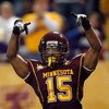 MINNEAPOLIS - NOVEMBER 01: Traye Simmons #15 of the Minnesota Golden Gophers celebrates his interception for a touchdown for a 14-10 lead over the Northwestern Wildcats during the second quarter at the Hubert H.Humphrey Metrodome on November 1, 2008 in Mi