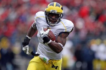 COLUMBUS, OH - NOVEMBER 22:  Brandon Minor #4 of the Michigan Wolverine sruns with the ball during the Big Ten Conference game against the Ohio State Buckeyes at Ohio Stadium on November 22, 2008 in Columbus, Ohio.  (Photo by Andy Lyons/Getty Images)