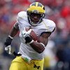 COLUMBUS, OH - NOVEMBER 22:  Brandon Minor #4 of the Michigan Wolverine sruns with the ball during the Big Ten Conference game against the Ohio State Buckeyes at Ohio Stadium on November 22, 2008 in Columbus, Ohio.  (Photo by Andy Lyons/Getty Images)