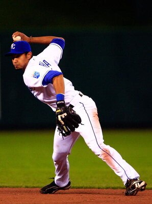 KANSAS CITY, MO - APRIL 24:  Shortstop Tony Pena, Jr. #1 of the Kansas City Royals throws toward first during the 6th inning of the game against the Chicago White Sox on April 24, 2007 at Kauffman Stadium in Kansas City, Missouri.  (Photo by Jamie Squire/