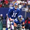 EAST RUTHERFORD, NJ - DECEMBER 07:  Eli Manning #10 and Shaun O'Hara #60 of the New York Giants line up for a play against  the Philadelphia Eagles during their game on December 7, 2008 at Giants Stadium in East Rutherford, New Jersey.  (Photo by Al Bello